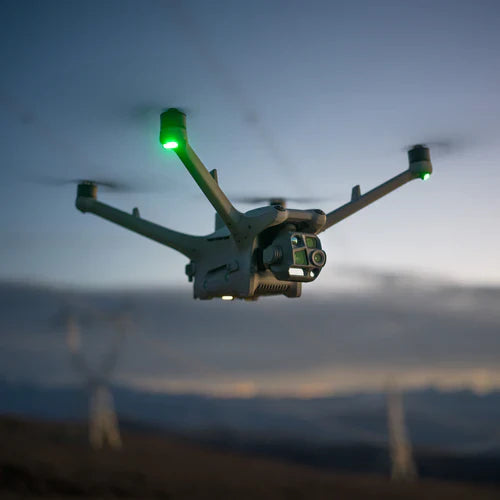 pic of DJI Matrice 4TD Drone flyin over a field