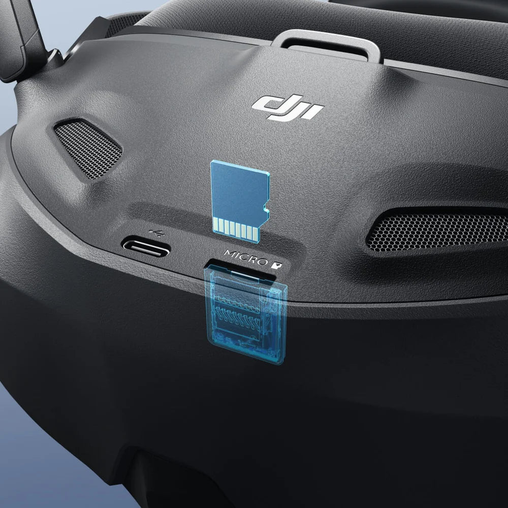 Close-up of the DJI Flight Goggles N3 showing USB-C and microSD card slots for seamless connectivity.